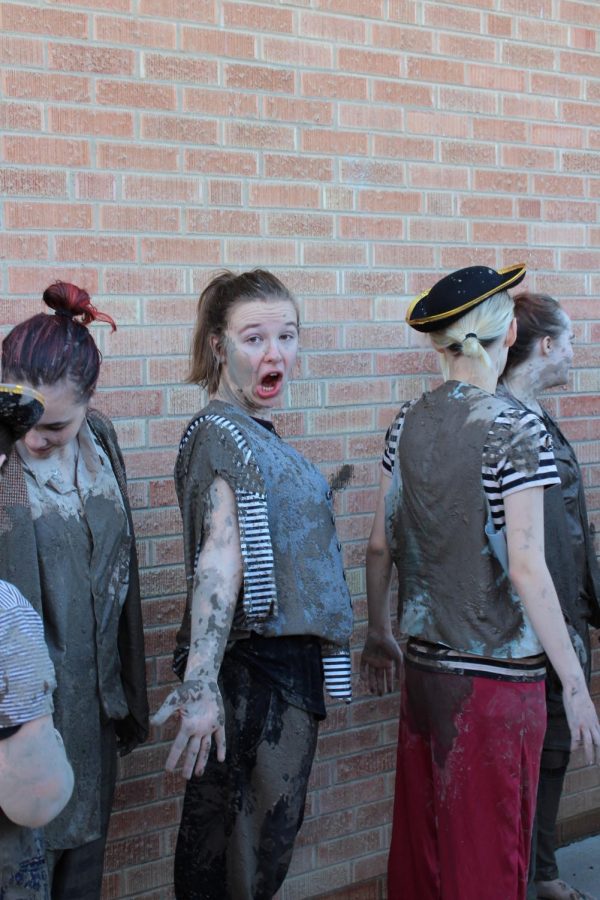 Drama students get into character for Peter and the Starcatcher by rolling in the mud like true sea dogs!