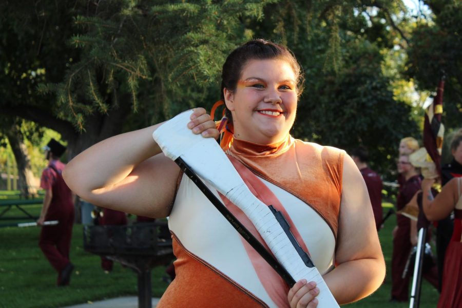 Central High School sophomore Bianca Gifford, a color guard member, practices spinning rifle.