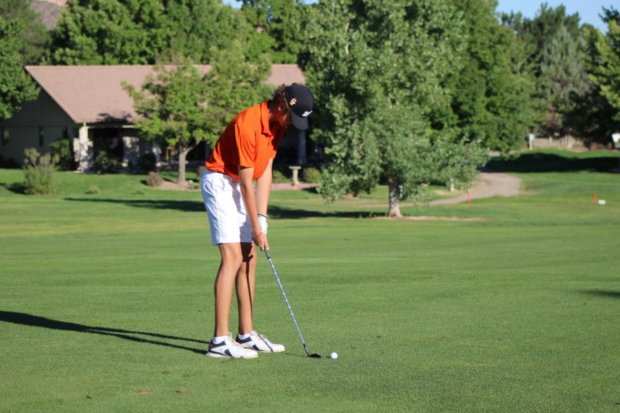 GJHS+sophomore+Jack+Kaul+lines+up+a+putt+during+a+tournament+this+season.+The+Tigers+qualified+for+state+for+the+first+time+in+five+years+and+finished+10th+in+Class+4A.