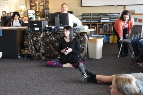 Dr. Melissa Carris leads a mindfulness and meditation presentation in Mr. Whitefords room with students after school. 