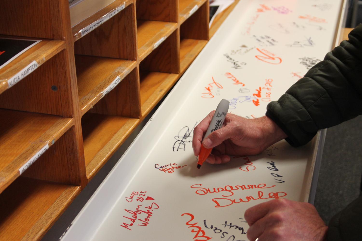 GJHS staff and students have been signing a steel beam in the Main Office that will be part of the new high school building. The $144.5 million building is scheduled to be completed in Fall 2024.