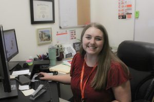 Jilleeann Warinner works in her office located in the GJHS library as the new college and career adviser.
