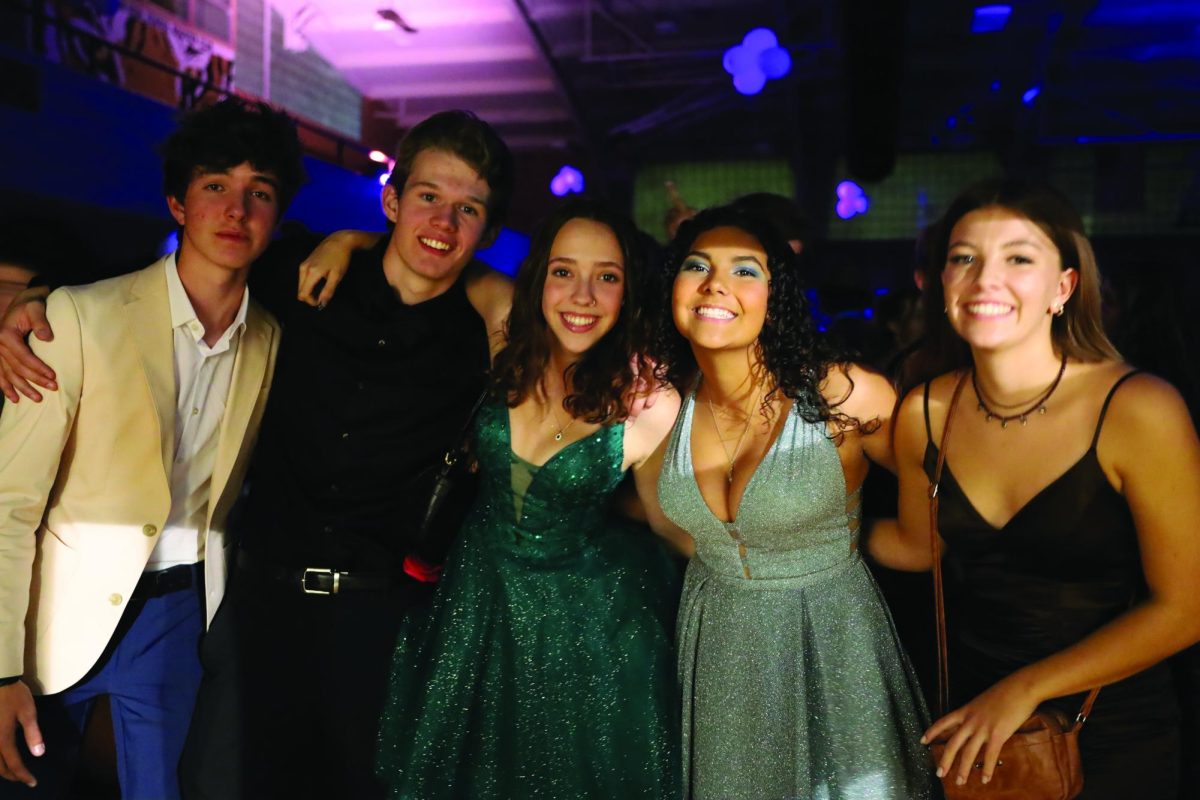 Rodney Atkinson, Jacob Colby, Aaleyah Bartell, Aly Ibarra, and Rachel Crawford are all smiles at Homecoming 2022. This years dance theme will be Night in the Cosmos.