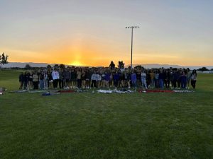 Seniors gather for a photo during their “Senior Sunrise” event where they met at Canyon View Park on August 21, 2023. Now the seniors are preparing for graduation and their futures ahead of them.