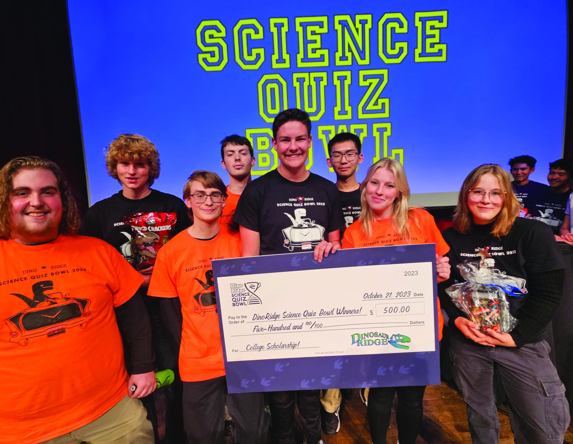 GJHS academic team received a check from Dinosaur Ridge for a college scholarship after the Science Quiz Bowl. The academic team competed in nationals last year and will be competing again this year.