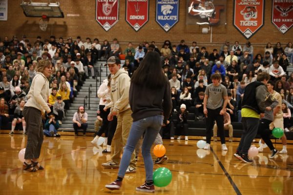 Students participate in an assembly game run by StuCo. Next year, Addie Boss and Maycie Sinicki will be in charge of running these assemblies.
