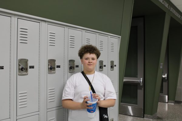 GJHS freshman Brayden Allen stands by a row of lockers on the second floor. As a freshman, Allen is one of the students allowed to have a locker in the new school building.