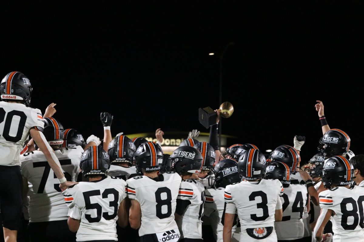 Grand Junction players celebrate after toppling rival Fruita Monument. The Tigers have a 4-0 record. 