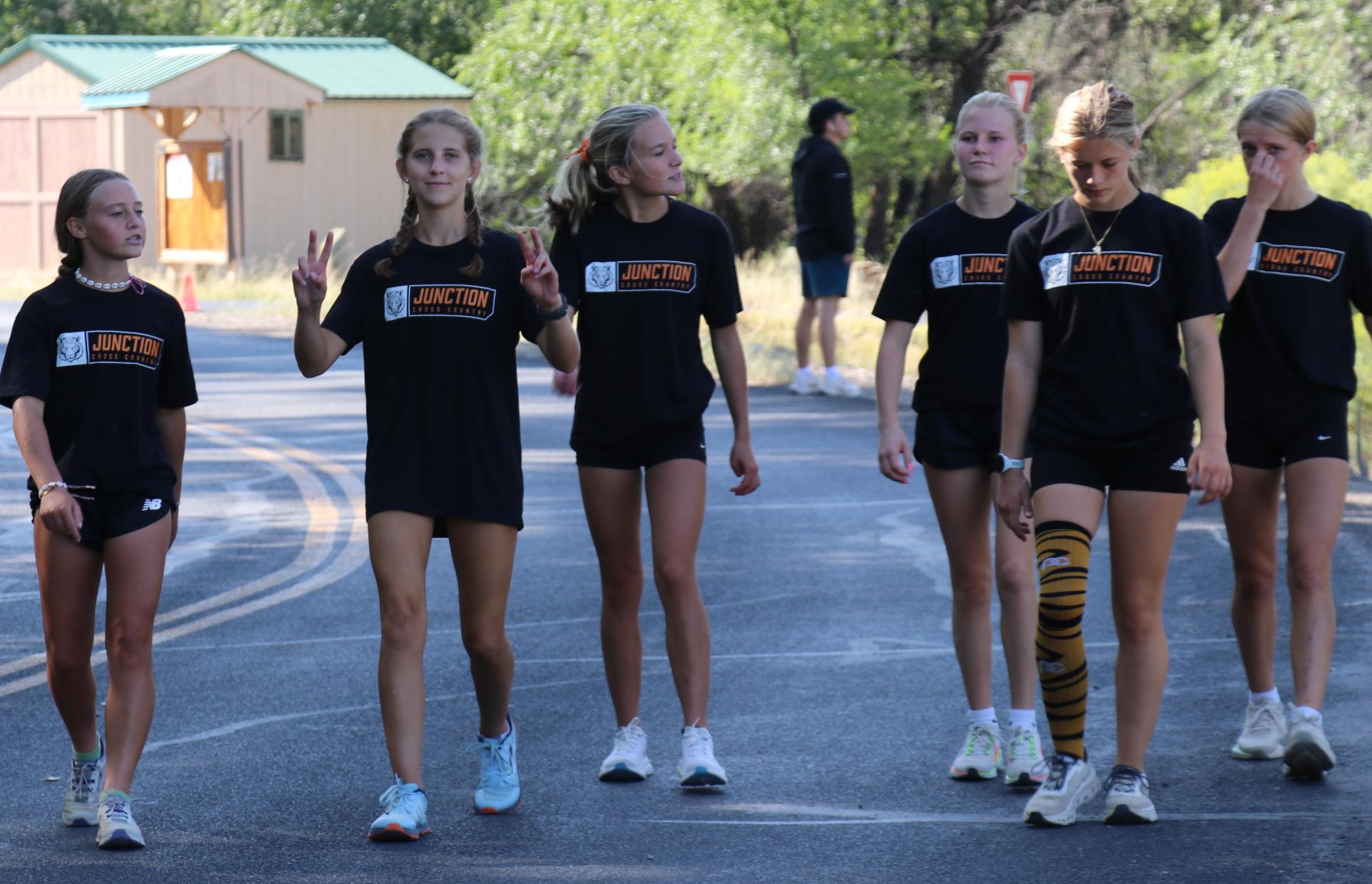 GJHS sophomore Leah Siering, second from left, leads the Tigers to the state cross country meet on Saturday in Colorado Springs. Siering finished second in the regional race to lead all GJ runners.