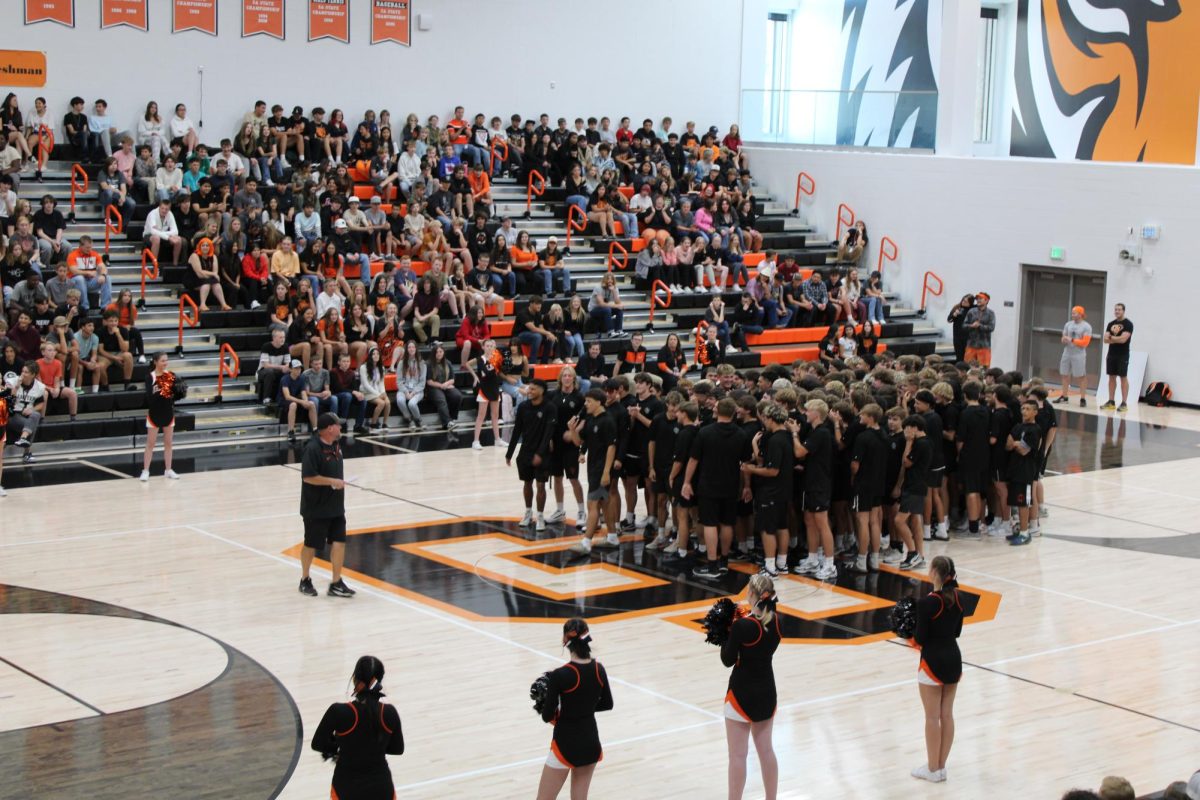 Before the homecoming game, the GJHS football team sang a chant from "Remember the Titans" to hype up students at the assembly.