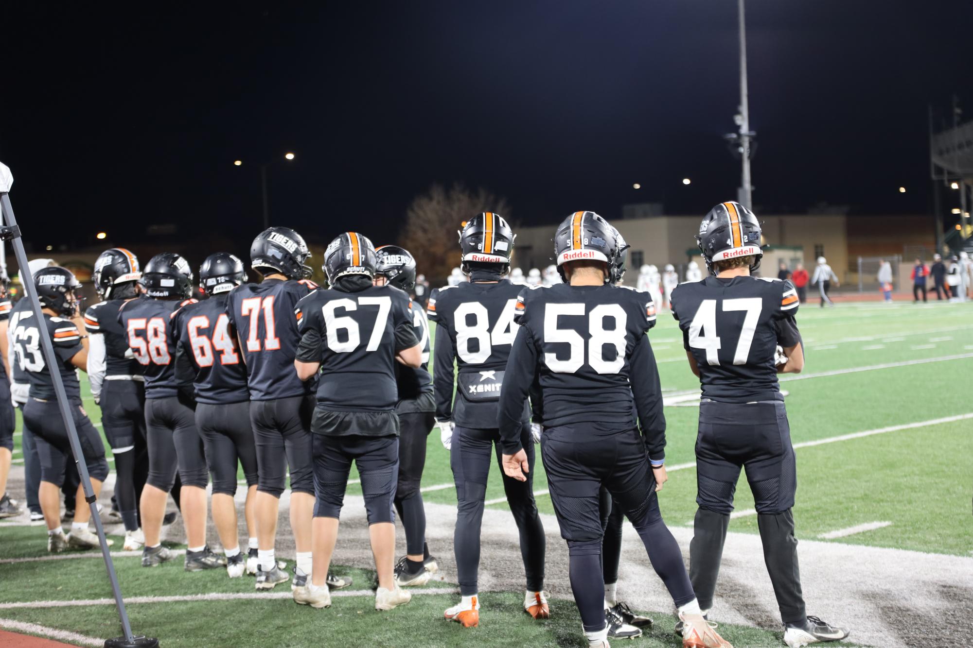 The GJHS football team on the sideline of their Halloween game. The tigers won 34-6, scoring a majority in the second half. 