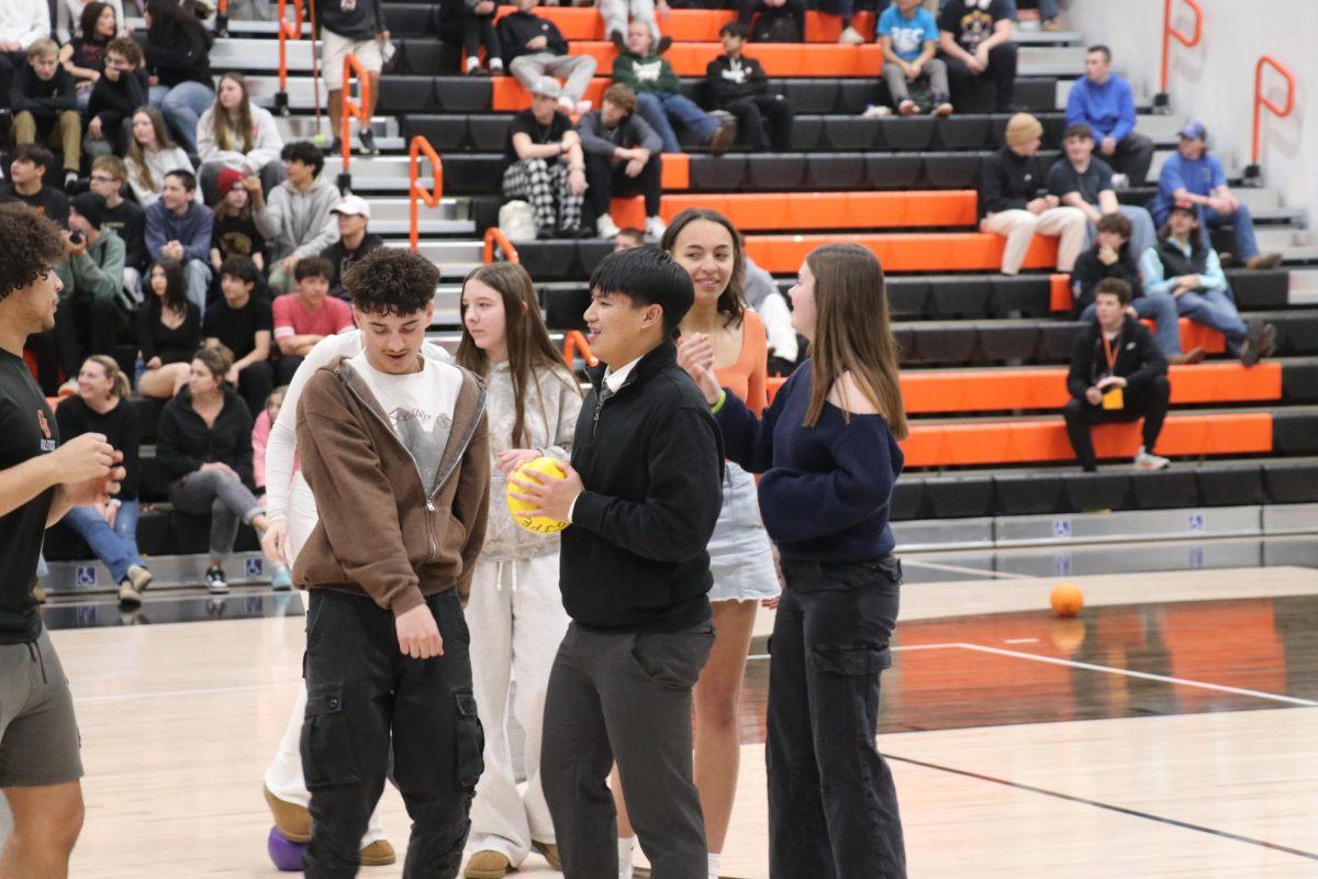 The GJHS sophomore and junior team celebrates after a dominant win in dodgeball during the winter sports assembly.