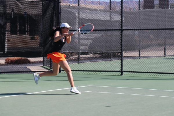 GJHS senior Anara Munkhtogoo shown playing at a tournament held by GJHS at the Colorado Mesa University tennis courts.