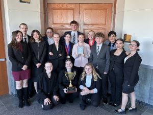 The Grand Junction High School Mock Trial teams are pictured shortly after their second-place finish in regionals. The tournament took place in the Grand Junction Municipal Court. From left to right, sophomore Maddison Ledet, junior Aidan Innis, freshman Gabby Hirth, non-GJHS student Teagan Brannan, freshman Paetyn Urroz, sophomore Riley Smith, freshman Ashlyn Sherraden, senior Lila Mottram, junior Jack Welling, senior Elli Scott, senior Tessa Egge, freshman Jazlin Timmens, sophomore Corbin Boies, sophomore Jonathan Dejesus, senior Elleana Madera, and senior Sophia Scott. (Photo taken by attorney coach Kali Roundy-Lockwood)