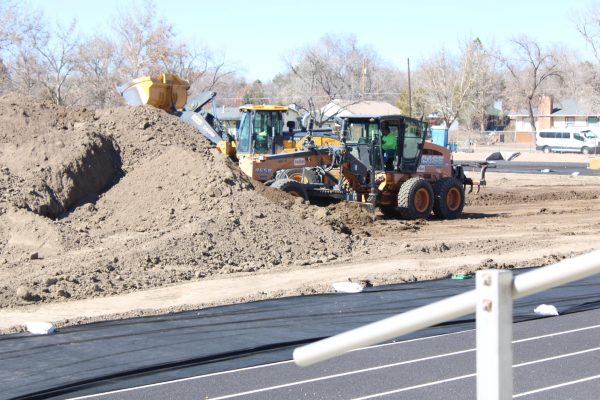 The GJHS track infield is currently under renovation to add artificial turf. The construction is preventing the track and field team from practicing on the newly resurfaced track facility this spring.