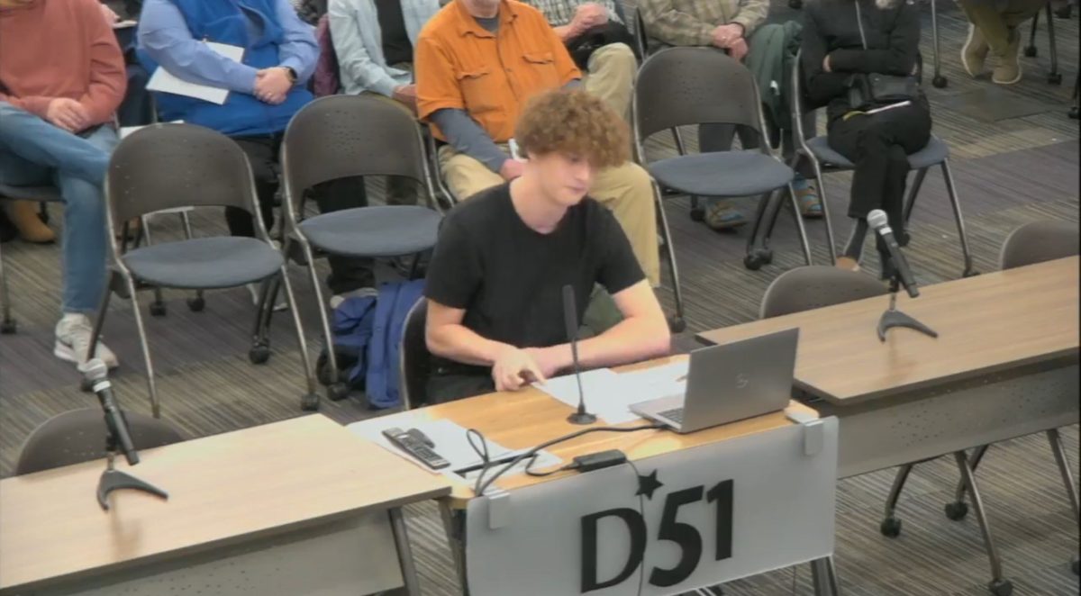 A screenshot taken from a recording of the Feb. 18 D51 School Board Meeting of GJHS senior Ben Himes speaking on the presence of ICE in the valley. Himes was amongst several other D51 students who spoke on the issue. 