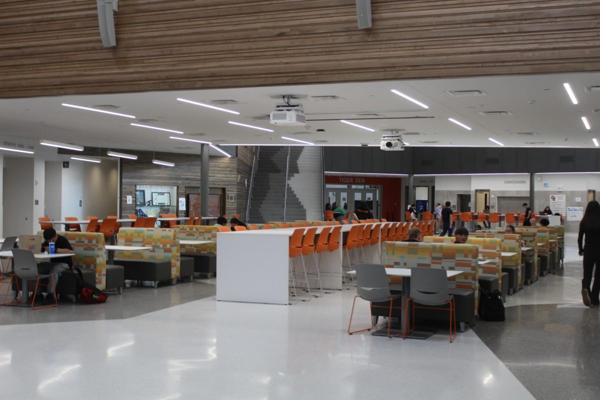 Grand Junction High School students sit in the commons. The commons are a favorite place for students to eat in and spend time at during breaks.