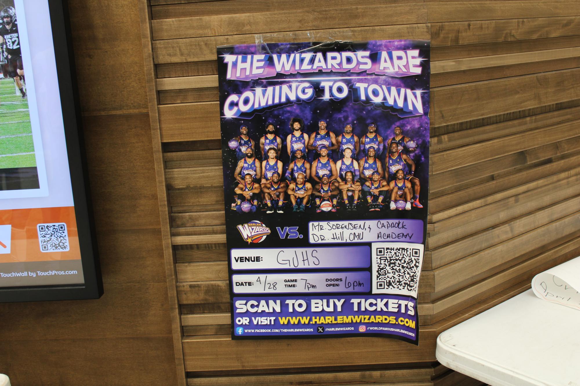 A poster featuring the date of the Harlem Wizards game is posted in the school commons. The Wizards will be playing at 7 p.m. Monday, April 28, in the GJHS gym.