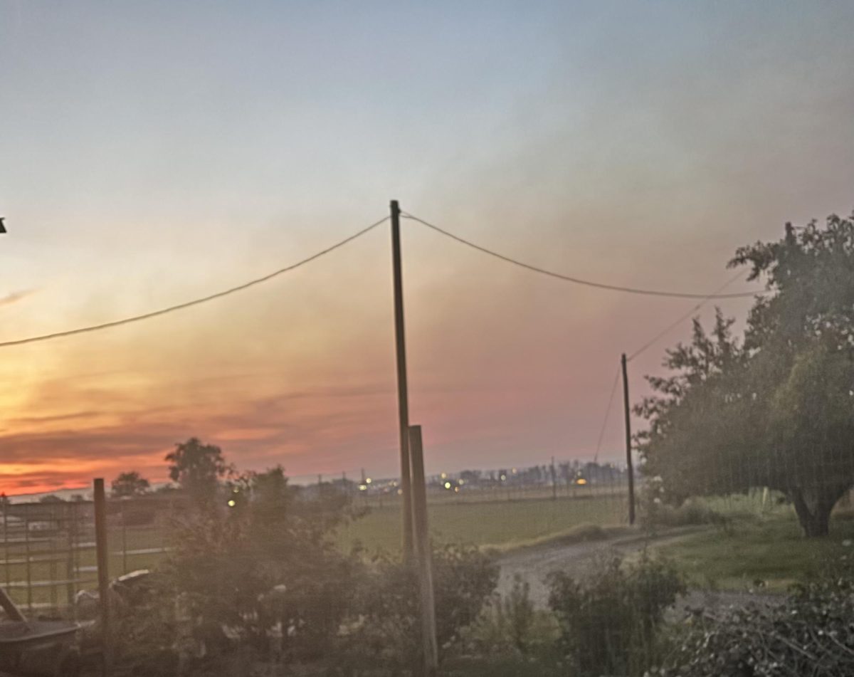 Smoke from the Turner Gulch Fire hovers over Grand Junction, blocking the view of the Bookcliffs. A dark haze can be seen filling the Grand Valley.