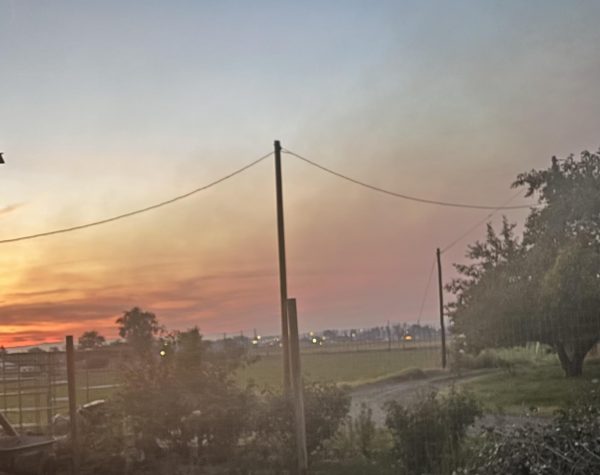 Smoke from the Turner Gulch Fire hovers over Grand Junction, blocking the view of the Bookcliffs. A dark haze can be seen filling the Grand Valley.