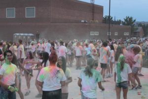 GJHS Students an hour after the color dance started at the bus loop, Aug 23. Students began to throw chalk at their peers.