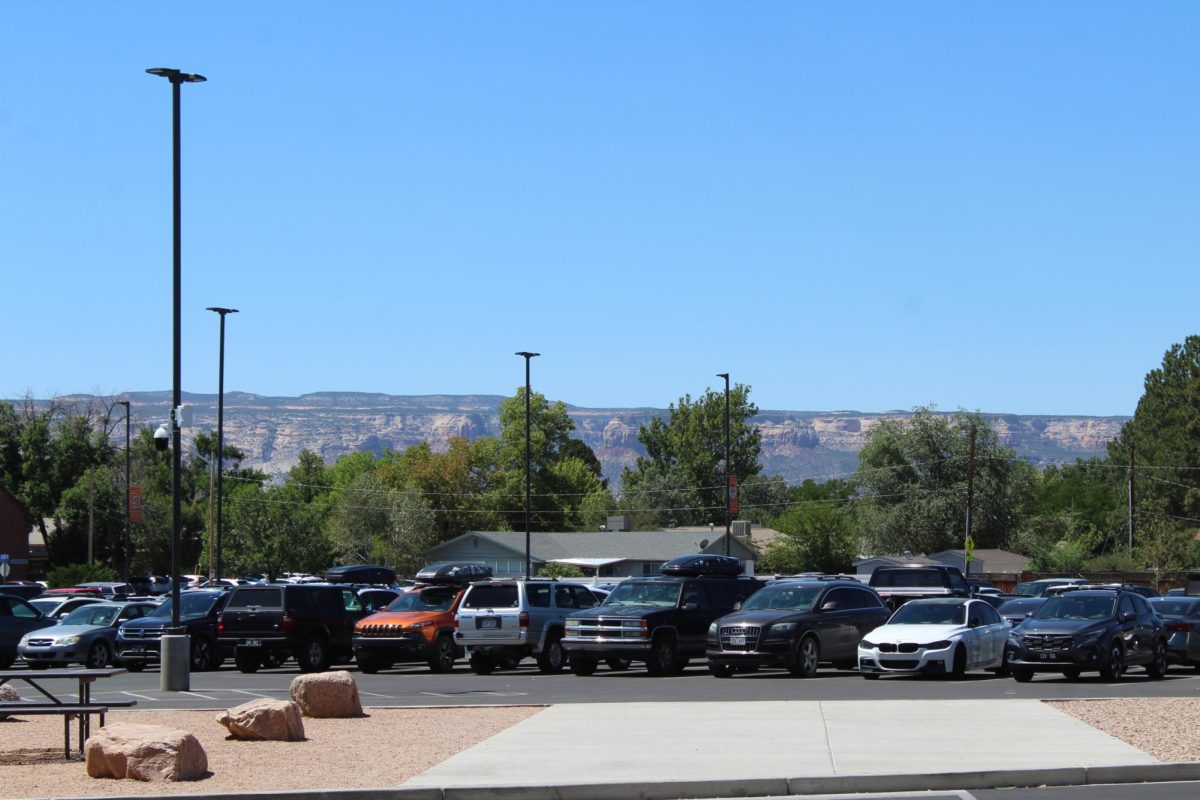 The GJHS parking lot, full of students’ vehicles with and without parking permits, which are available in the front office. All students parked in the lot without a permit after August may be faced with a fee of $10.