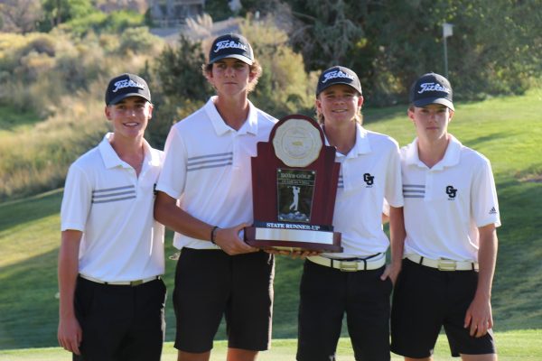 The fall 2024 GJHS boys’ golf team poses for a photo taken shortly after state, holding the second place trophy in the Tiara Rado Golf at Grand Junction, CO. Since the qualifications for state are different this year, it is possible that only a few golfers play in the state tournament this year.