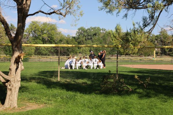 The Grand Junction High School Softball team huddles up after a 12-0 win over Gunnison High School. The team’s new head coach is Scott Else.