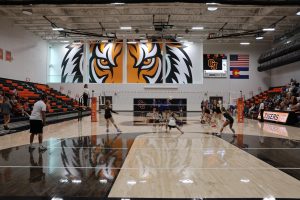 GJHS volleyball player Norah Gruwell saves the ball against the Roaring Fork High School volleyball team. They won 3-1, which was their 3rd win out of 4 losses due to the coach’s new style. 