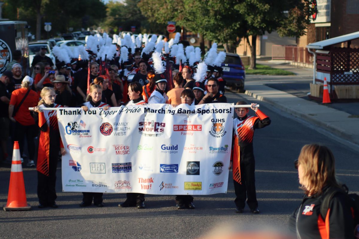 The GJHS marching band begins their march at the homecoming parade. The parade took place on Main Street.