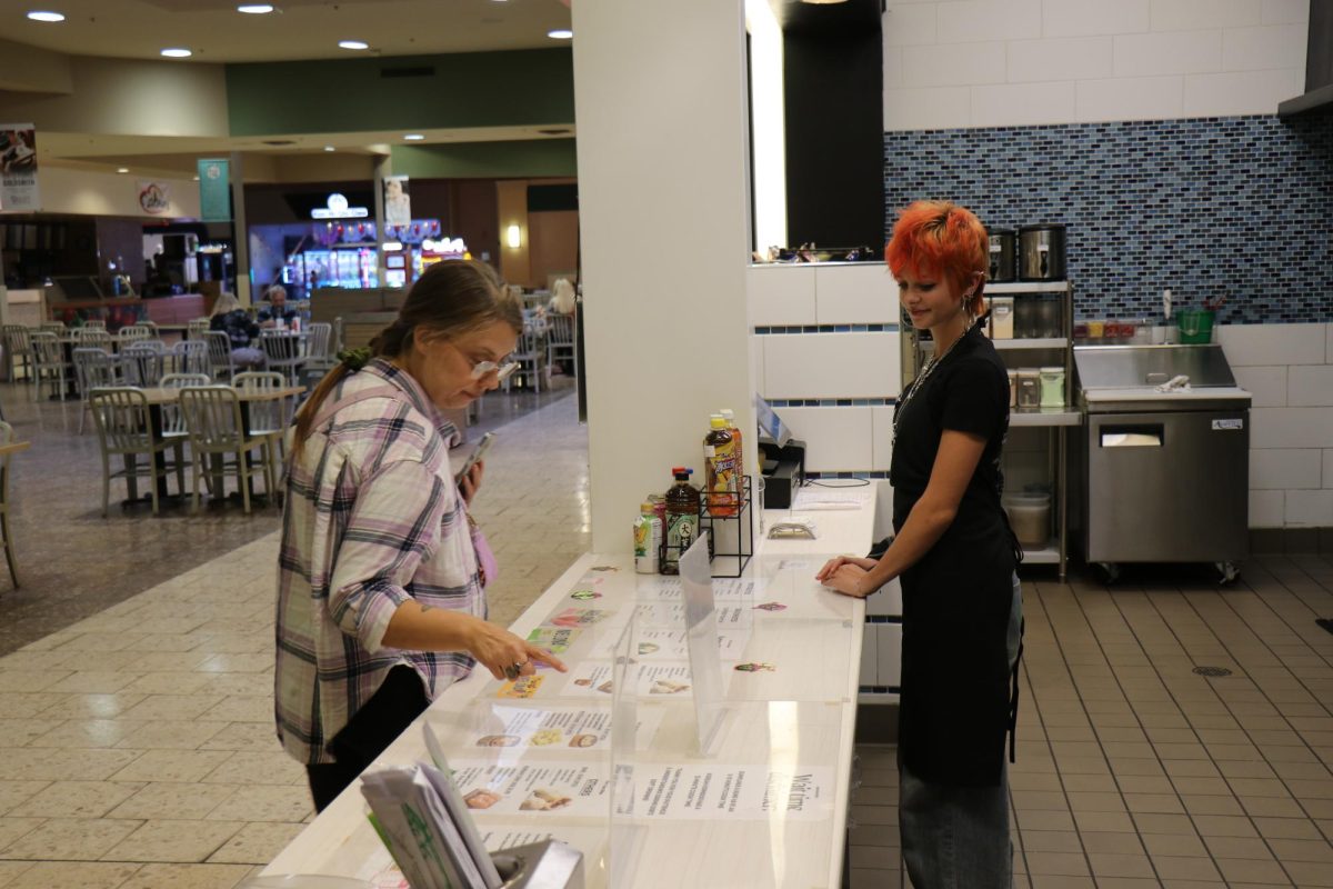 GJHS junior Bean Engel works at Dim Sum Bites in the Mesa Mall Food Court. She started working there on Oct. 15 and enjoys it there.