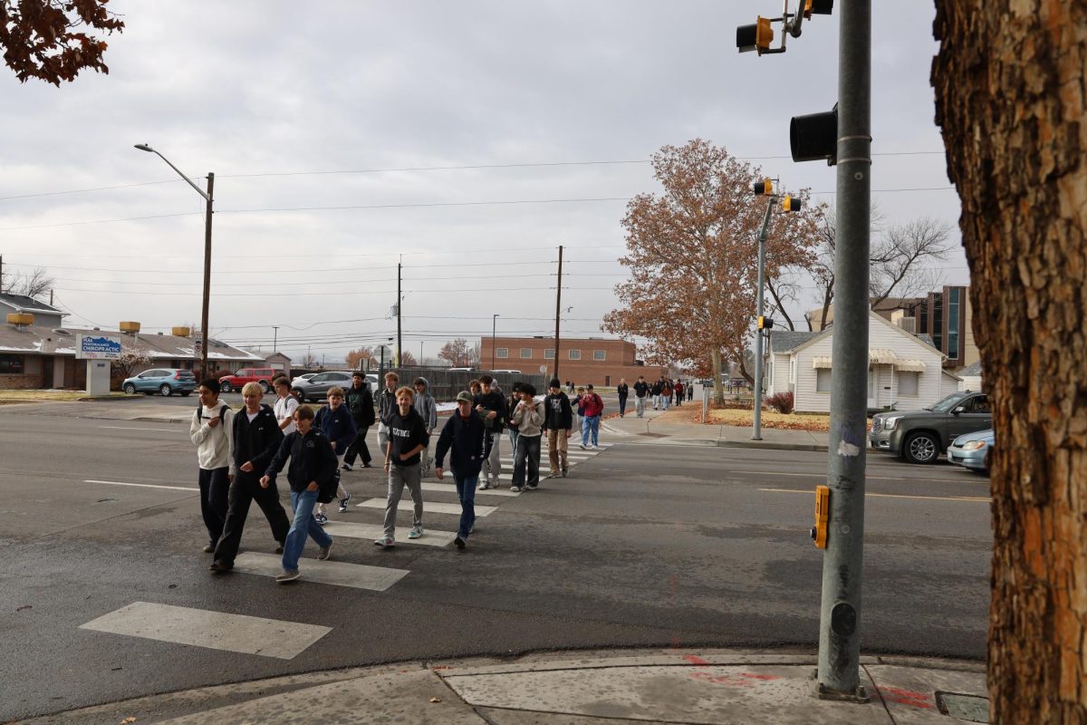 Dozens of GJHS students walk from GJHS to the adjacent CMU campus for lunch by crossing 7th Street. Students are allowed on the CMU campus, although they must behave safely while there.