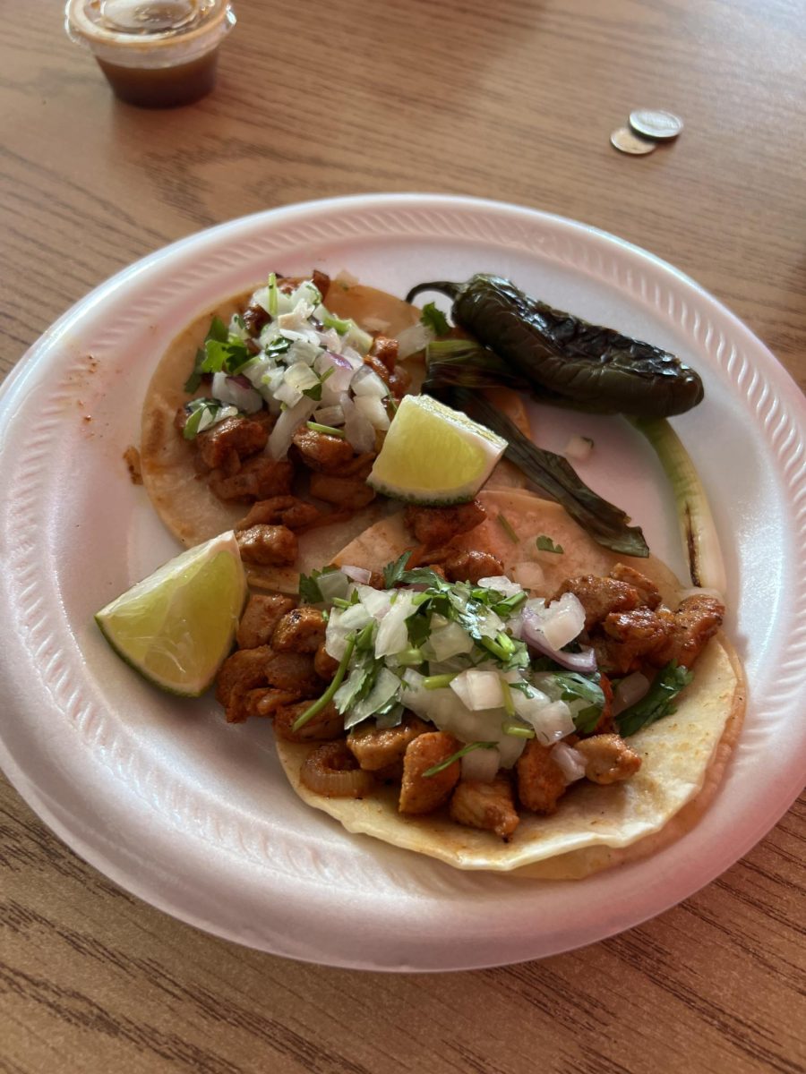 Some fantastic pastor (pork) tacos from Pollo Azado. The restaurant also offers chicken, carne asada, and lengua tacos with a variety of sauces on the side.
