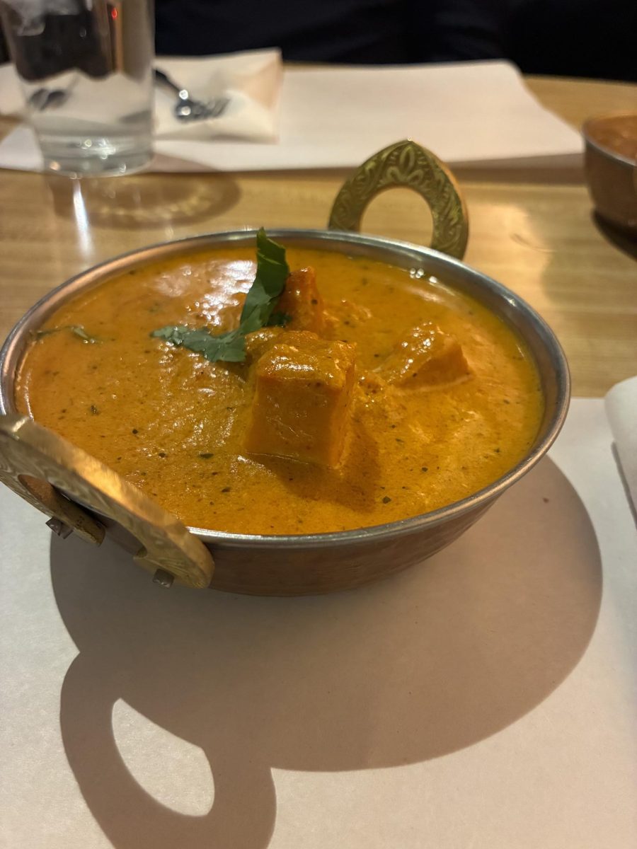 A delicious bowl of Chicken Tikka Masala waiting to be consumed. This Tikka Massala was purchased from Karma Kitchen, but looks very similar at all locations.