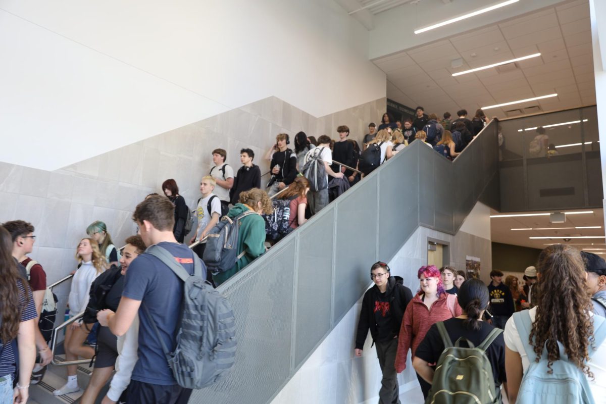 Students walk through the halls during a passing period. Sometimes, students will not show up to their next class and ditch.
