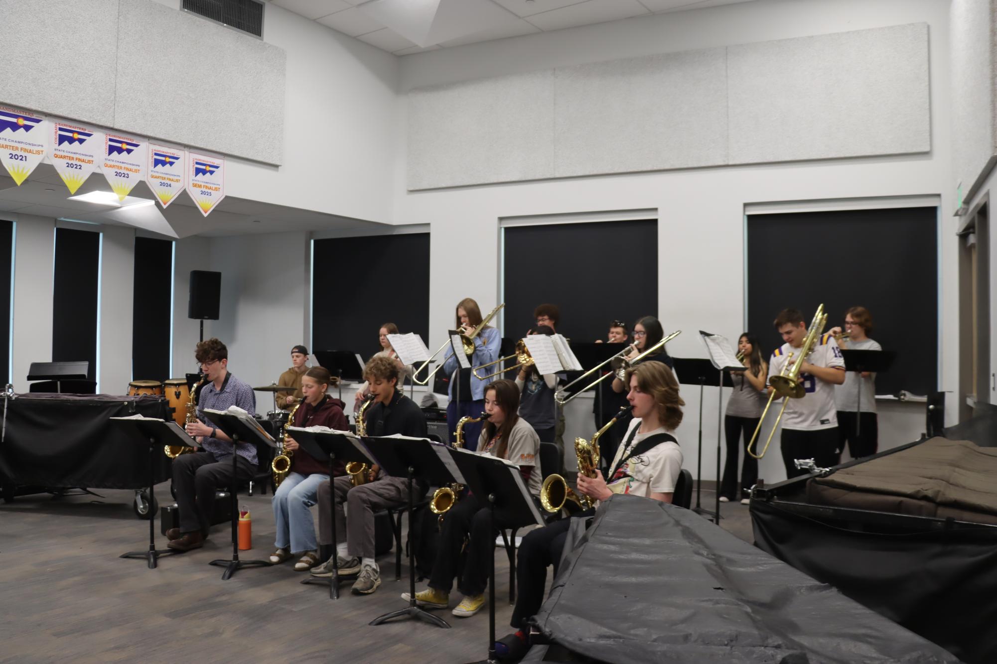Jazz I rehearses one of their songs in the band room. Many of the songs they will play at Spring Swing have been in their folders since the start of the year.