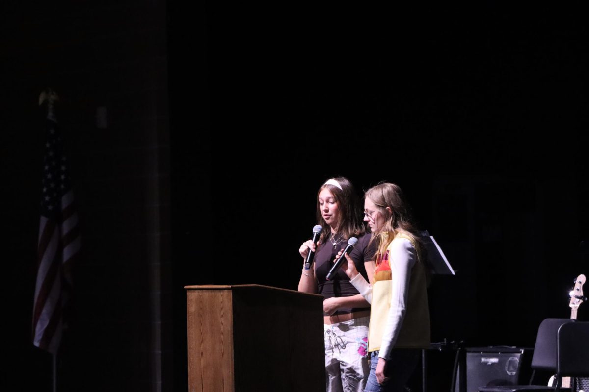 StuCo-elected co-presidents Peyton McKinley and Ellery Barney deliver their speech to the student body at the assembly. The pair won the only competitive race in the StuCo election.
