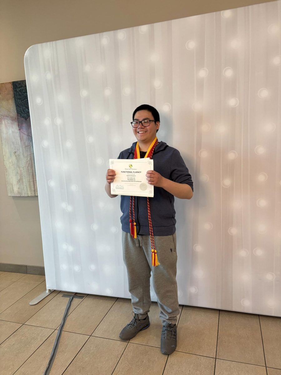 This captures Terrence Liu receiving his Seal of Biliteracy in Mandarin and French. Liu will attend college at UC Berkeley. 