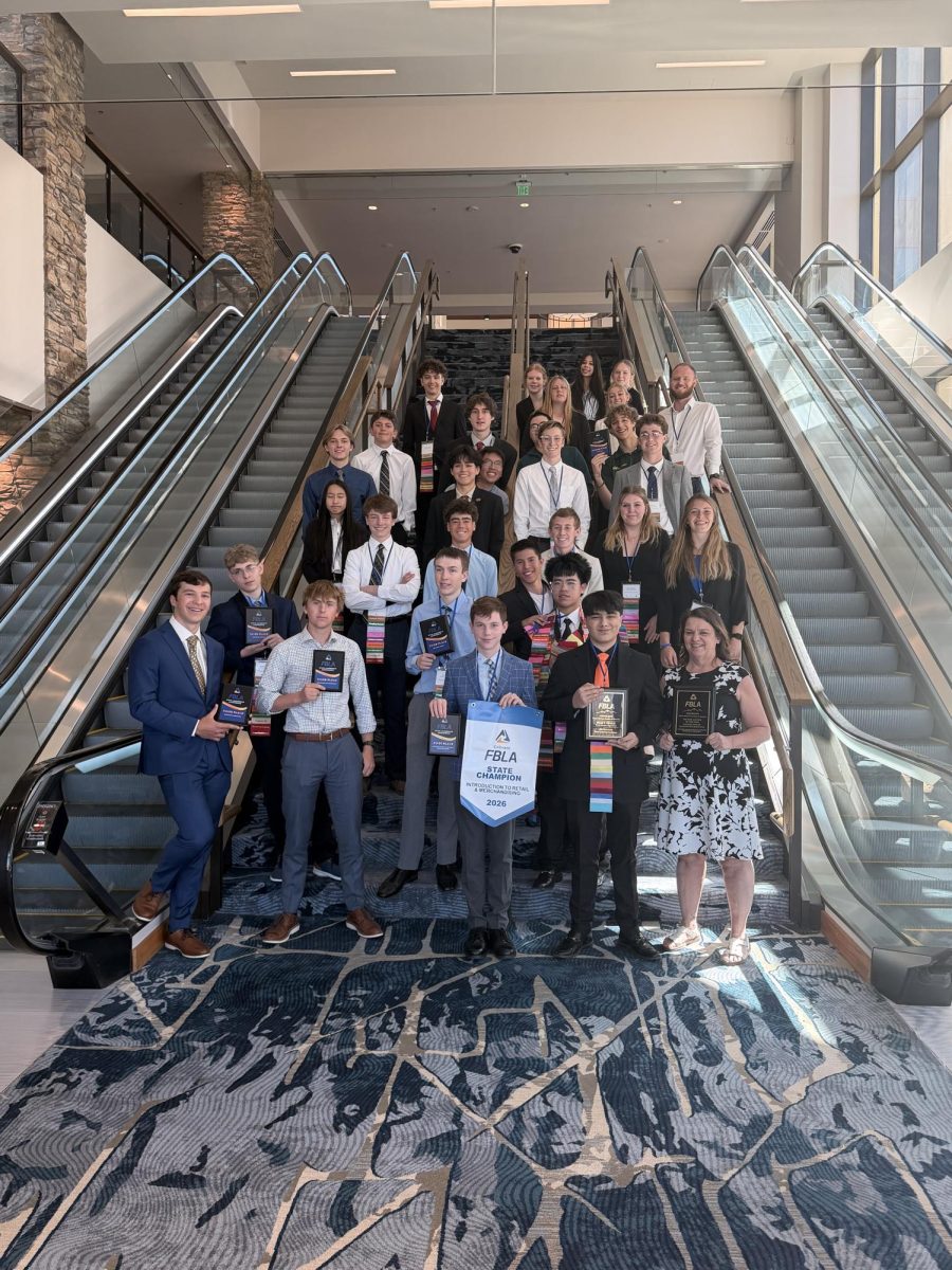 FBLA students pose for a photo showcasing their state accomplishments. The team had a very successful season for the 2025-2026 school year.