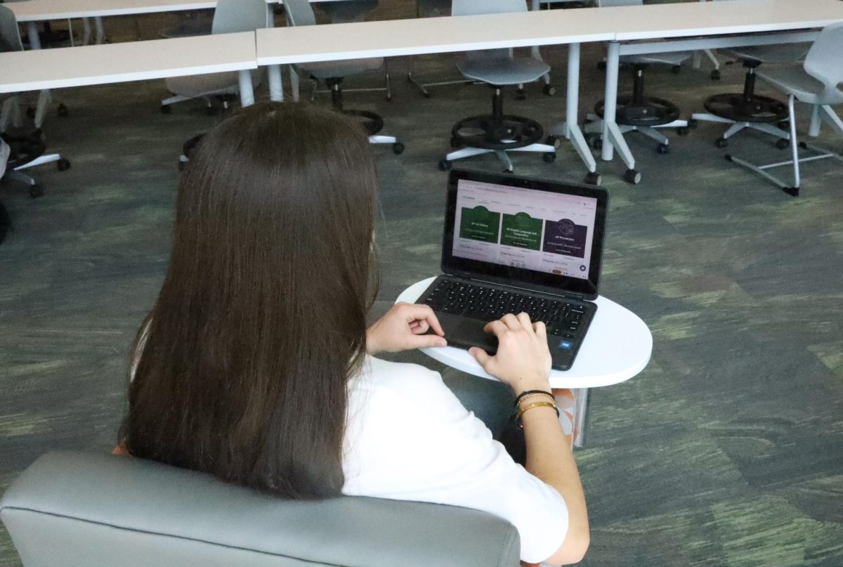 GJHS junior Penelope Kuehlhorn studies in the library for her AP classes. College Board’s AP Classroom provides a variety of resources to help students understand course content.
